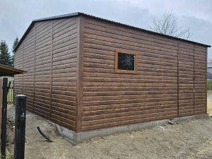 Garaż blaszany dwustanowiskowy 6x5 m z blachą drewnopodobną — producent Karstal